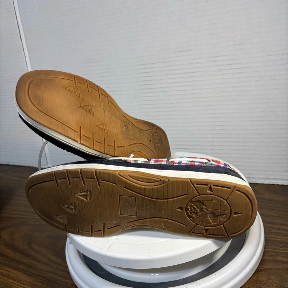Falls Creek women’s 11 boat or deck shoes. Leather laces navy w/red & white trim